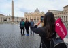 A group of tourists in Rome having their picture taken by a tour guide from The Tour Guy.