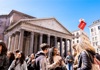 A group of tourists in front of the Pantheon with their guide from The Tour Guy.