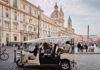People on Tuk Tuk looking at Piazza Navona