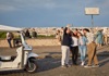 People taking selfie on Rome's hills with Tuk Tuk