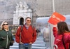 A couple standing outside of the Vatican with their guide from The Tour Guy.