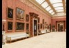 An image of the State Rooms inside Buckingham Palace.