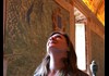 A tourist inside the Hall of Maps.