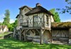 A picture of the Queen's Hamlet at the Palace of Versailles.