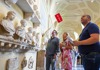 A pair of tourists inside the Vatican Museums with their guide from The Tour Guy.