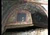 An image of a fresco on the walls of the Roman Catacombs.