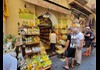 An image of tourists outside of a souvenior shop in Sorrento.