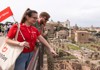 A tourist looking over the Roman Forum with his guide from The Tour Guy.