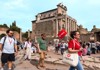 A group of tourists walking through the Roman Forum with their guide from The Tour Guy.