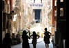 A group of tourists in the Colosseum Underground.