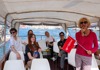 A tour group taking a boat ride in Venice with their guide from The Tour Guy.
