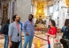 A pair of tourists inside St. Peter's Basilica with their guide from The Tour Guy.