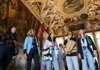 A group of tourists inside the Doge's Palace with a guide from The Tour Guy.