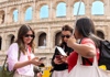 A pair of tourists checking in to their tour with The Tour Guy.