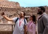 A group of tourists taking a selfie from the 2nd level of the Colosseum while on tour with The Tour Guy.