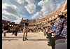A tour group at the Colosseum on the Arena Floor with tour guide from The Tour Guy 