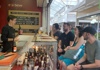 Group of people having a Wine Tasting in Testaccio market in Rome