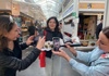 Guide with food and people taking pictures in Testaccio market