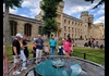 A group of tourists inside the London Tower with their guide from The Tour Guy.