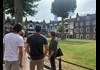 A group of tourists inside the Tower of London with their guide from The Tour Guy.