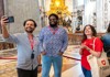 Two friends taking a selfie inside St. Peter's Basilica with their guide from The Tour Guy.
