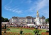 An image of the front of Buckingham Palace in London.