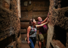 A pair of tourists inside the Priscilla Catacombs in Rome.