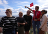 A group of tourists on the summit of the Eiffel Tower with a guide from The Tour Guy.